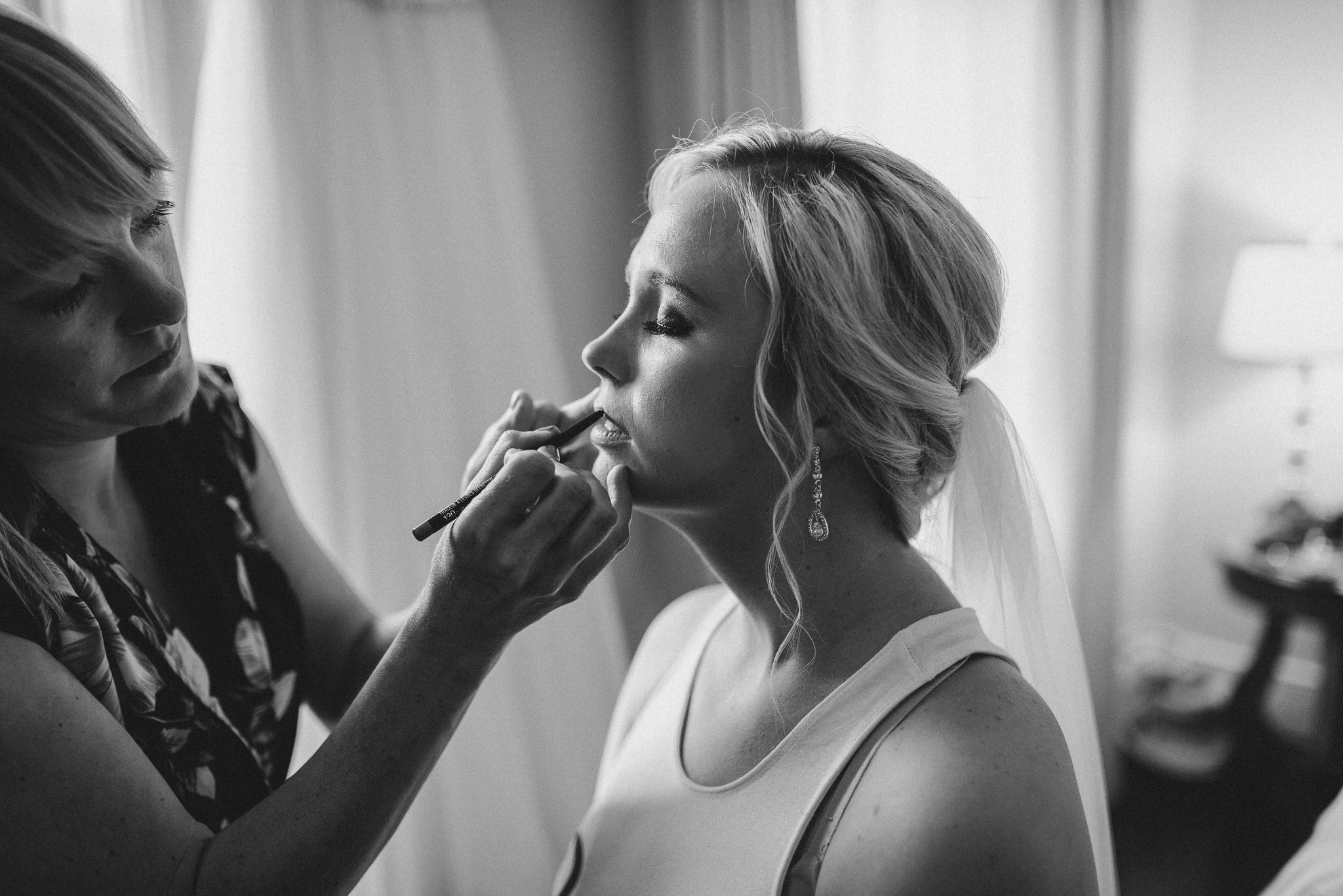 Ancaster Mill Wedding - bride getting makeup done